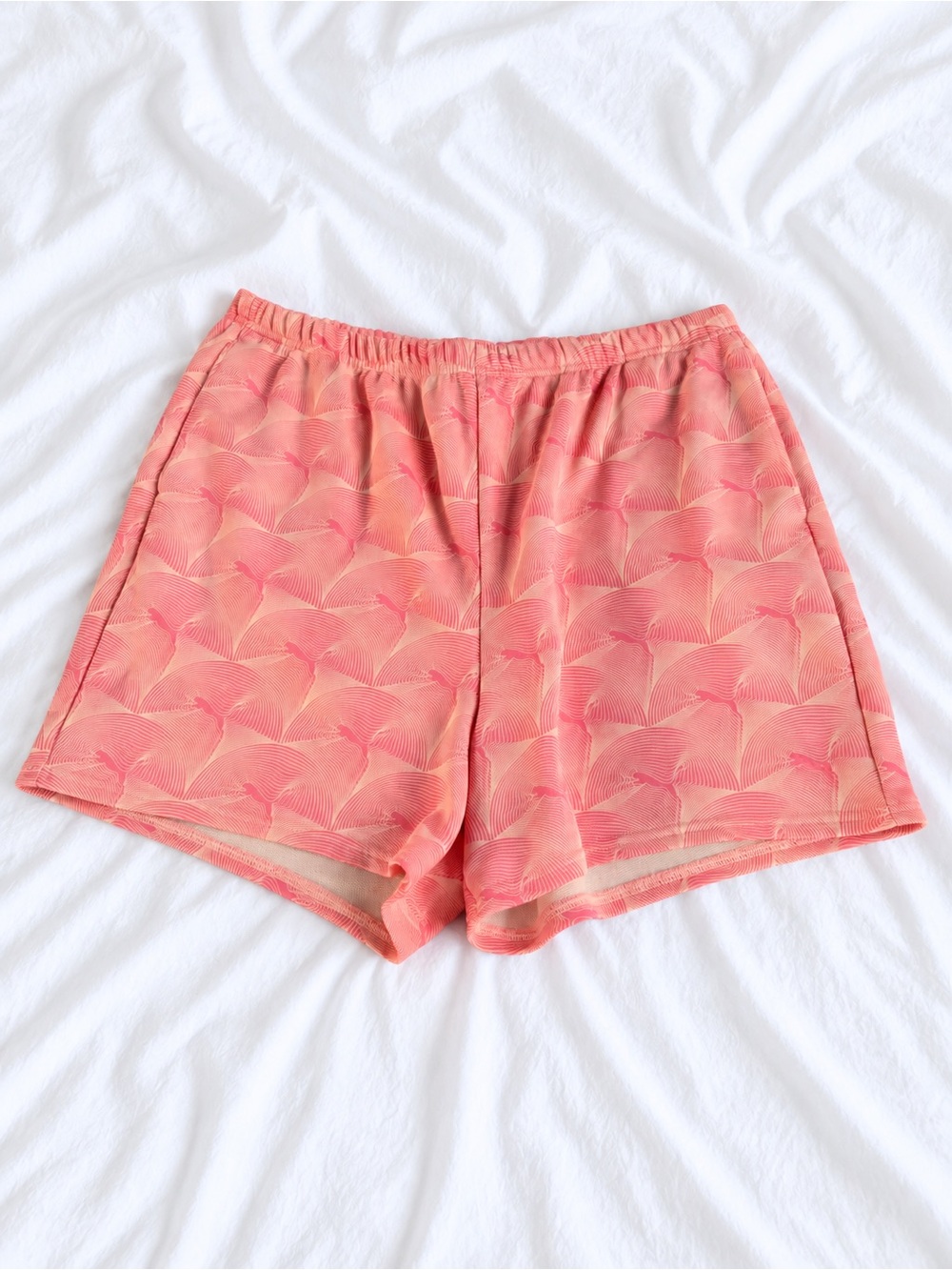 Puma Coral Pink Athletic Shorts with Subtle Shell Print